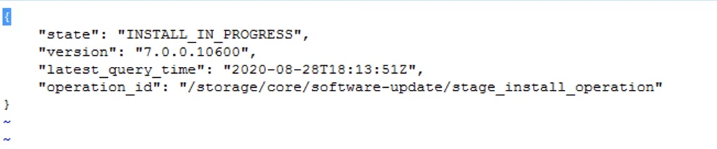 The image shows a JSON snippet indicating a vCenter Appliance update is in progress.
