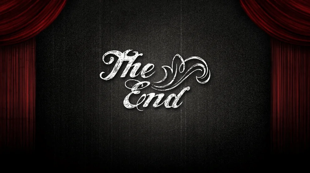 The image shows “The End” text on a black background with red curtains, likely a closing screen for a presentation or video.