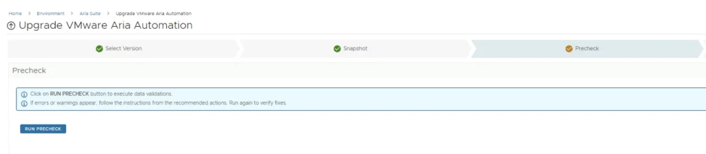 Upgrade VMware Aria Automation precheck step shows button to run precheck.