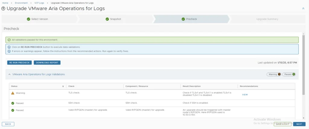 The Precheck step shows all validations passed, with options to re-run or download a report.