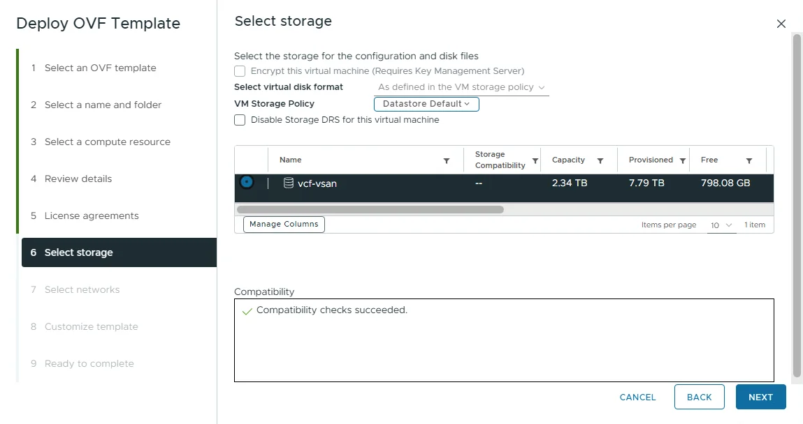 Select storage step of the Deploy OVF Template wizard with the vcf-vsan datastore selected and compatibility checks succeeded.